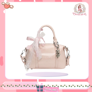 Túi cầm tay hồng pastel phối nơ ren